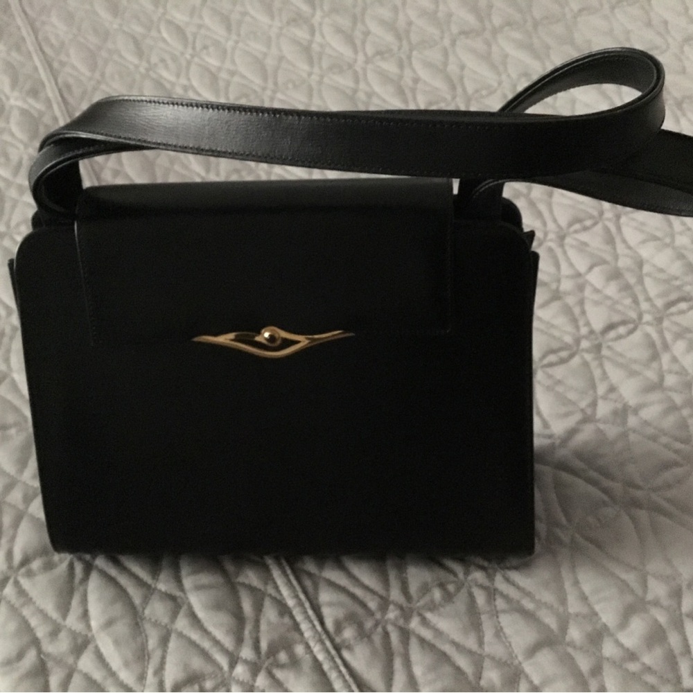 Authentic Cartier bag back in perfect condition